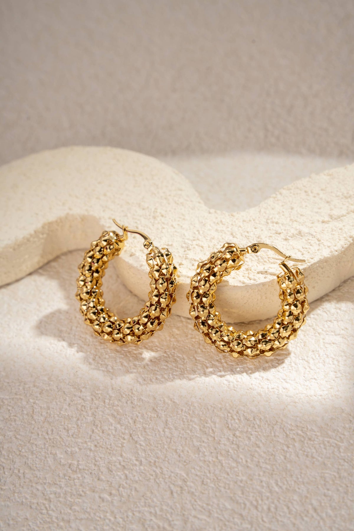 Gold stainless steel woven hoop earrings