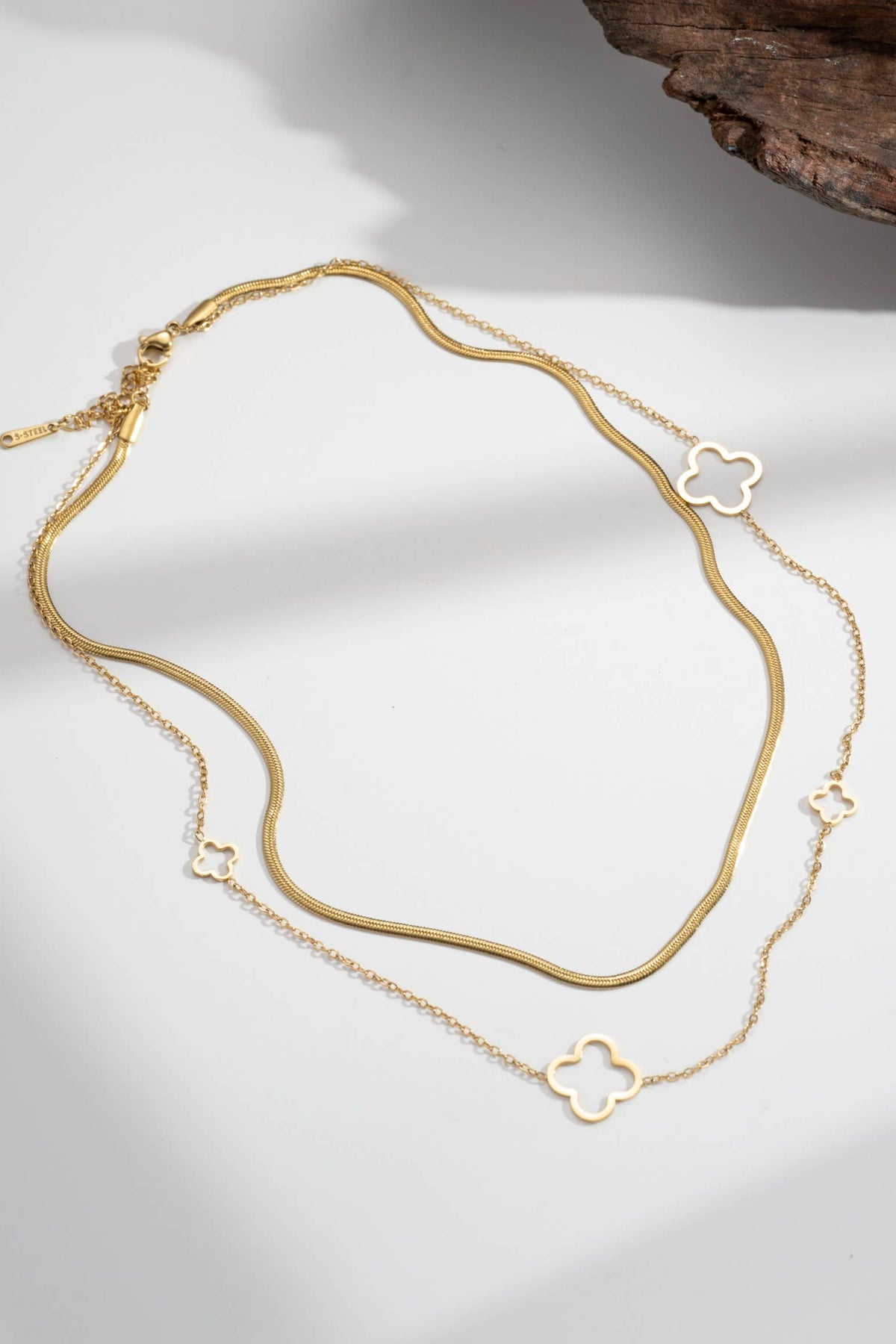 Double chain necklace in gold stainless steel with openwork clovers