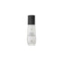 Ahava Osmoter Concentrate Smoothing Lotion in a sleek bottle, surrounded by vibrant minerals.
