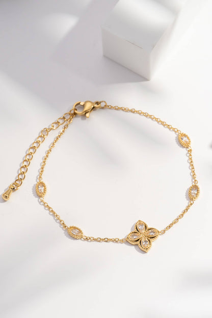 Golden bracelet with crystalline flower and fine steel links